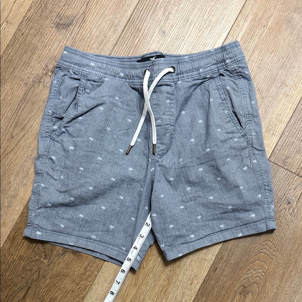Hollister Light Heather Blue Drawstring Shorts with Tiny White Palm Motif